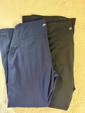 Women’s Fabletics flare leg performance leggings.